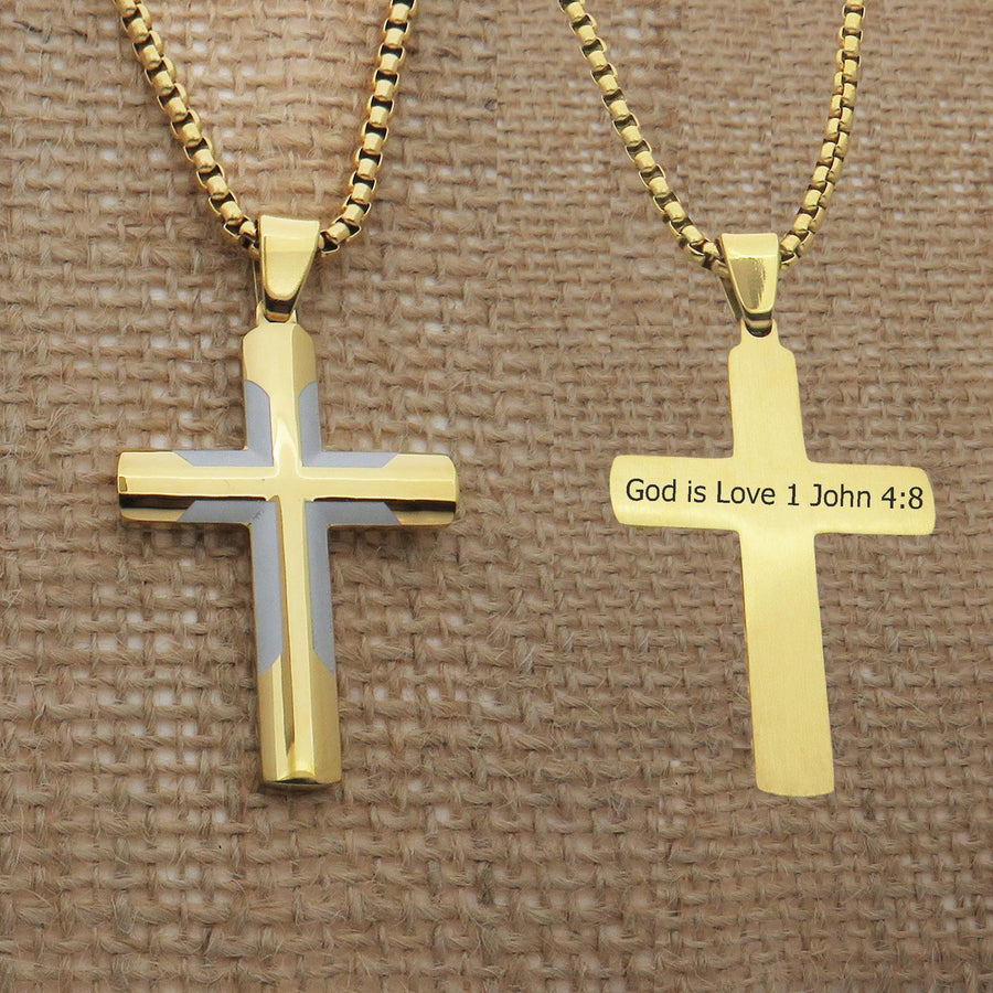 two gold-colored cross necklaces with religious text on them.
