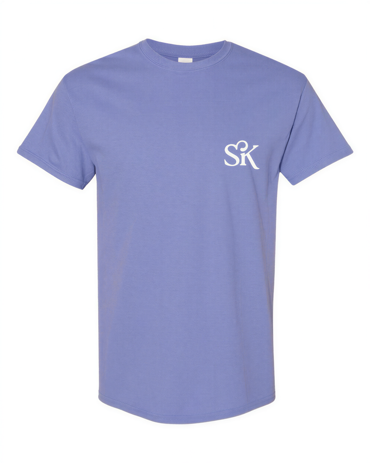 A light purple t-shirt with a white logo on the left side.