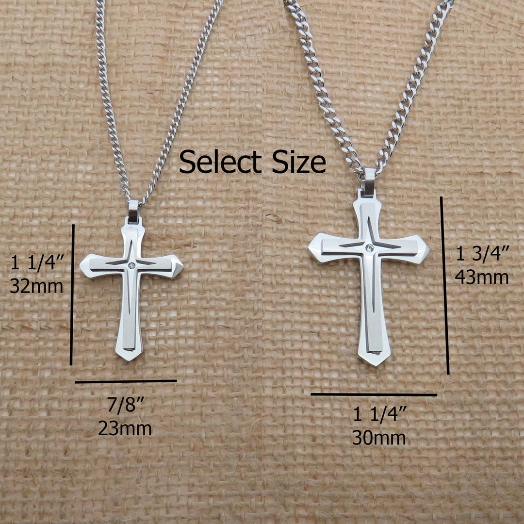 two silver cross necklaces with different sizes, each labeled with its corresponding size in millimeters.