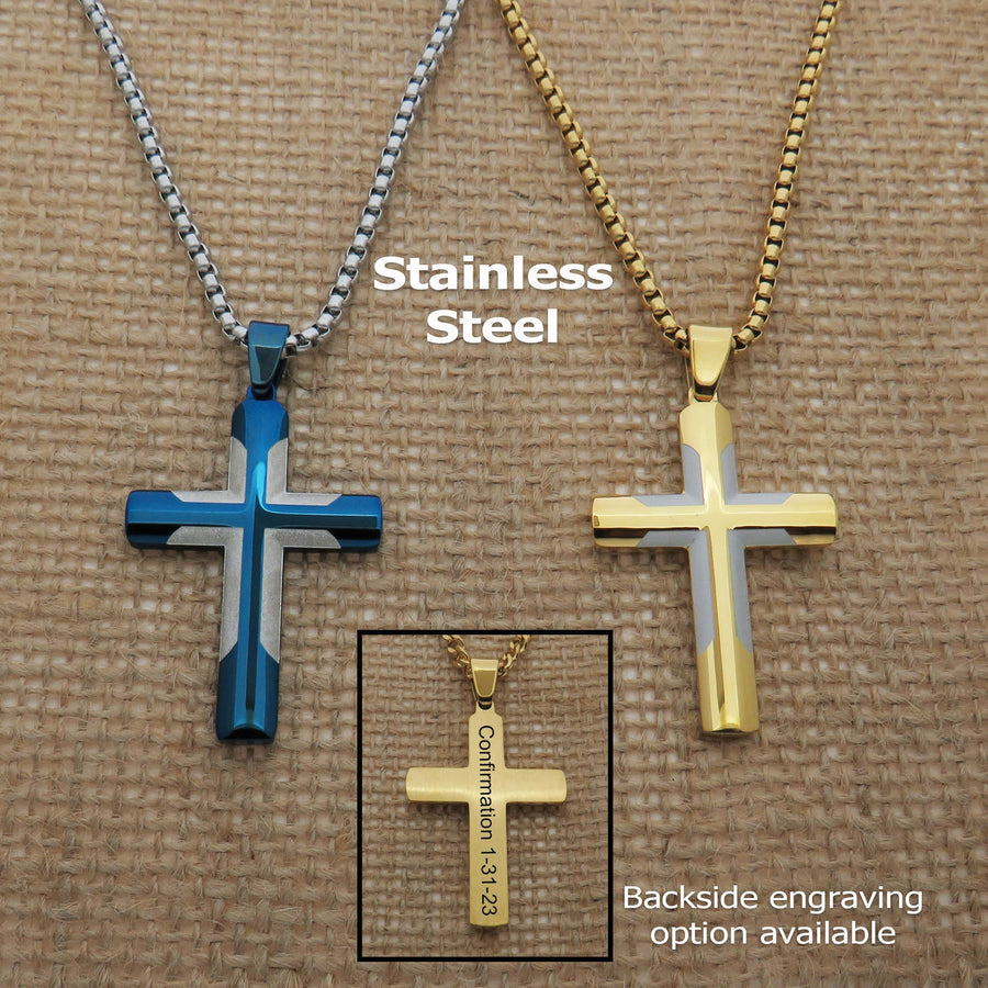 two stainless steel cross necklaces, one in blue and one in gold, with the text "Stainless Steel" and "Confirmation 1-3-23" engraved on them.
